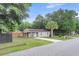 Charming single-story home with lush lawn, long driveway, and a classic, quaint curb appeal at 3316 Island Estates Dr, Johns Island, SC 29455