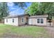 Charming single-story home with a well-manicured lawn and inviting entrance at 3316 Island Estates Dr, Johns Island, SC 29455