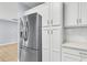 Modern kitchen with stainless steel refrigerator, pantry and ample storage for all your culinary needs at 3316 Island Estates Dr, Johns Island, SC 29455