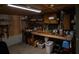 Spacious basement with workbench and built-in storage for organizing tools and projects at 3323 Myrtle St, Edisto Island, SC 29438