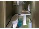 Compact bathroom with a pedestal sink and toilet, featuring a charming nautical-themed design at 3323 Myrtle St, Edisto Island, SC 29438