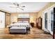 Cozy bedroom with nautical-themed decor, warm lighting, and ample closet space at 3323 Myrtle St, Edisto Island, SC 29438