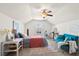 Vaulted ceiling bedroom with a ceiling fan, light-blue walls, and carpet at 3707 Blackjack Rd, Ladson, SC 29456