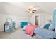 Bright bedroom featuring a sloped ceiling, ceiling fan, and coordinated decor at 3707 Blackjack Rd, Ladson, SC 29456