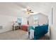 Vaulted ceiling bedroom featuring a comfortable sitting area and a bed at 3707 Blackjack Rd, Ladson, SC 29456