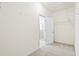Walk-in closet with neutral carpet and a door leading to the bathroom at 3707 Blackjack Rd, Ladson, SC 29456