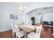 Bright dining room featuring a chandelier and lots of natural light with convenient access to living area at 3707 Blackjack Rd, Ladson, SC 29456