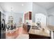 Bright kitchen with granite countertops, stainless steel appliances, and an adjacent dining area at 3707 Blackjack Rd, Ladson, SC 29456