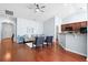 Bright open-concept living room with hardwood floors and comfortable seating at 3707 Blackjack Rd, Ladson, SC 29456
