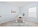Bright room featuring a desk, chair, patterned rug, and light-blue walls at 3707 Blackjack Rd, Ladson, SC 29456