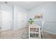 Bright room featuring a desk, chair, patterned rug, and light-blue walls at 3707 Blackjack Rd, Ladson, SC 29456