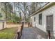 Wooden deck overlooking the backyard and storage building at 408 N Parler Ave, Saint George, SC 29477
