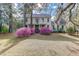 Charming two-story home with mature trees and azalea bushes at 408 N Parler Ave, Saint George, SC 29477