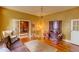Spacious living room with hardwood floors, natural light, elegant decor, and open layout, great for entertaining at 408 N Parler Ave, Saint George, SC 29477