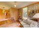 Comfortable living room with decorative wallpaper, hardwood floors, and vintage furnishings, creating a cozy atmosphere at 408 N Parler Ave, Saint George, SC 29477
