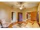 Comfortable living room with hardwood floors, tan walls and views of other rooms and hallway at 408 N Parler Ave, Saint George, SC 29477