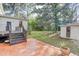 Backyard patio with steps to backyard at 408 N Parler Ave, Saint George, SC 29477