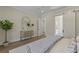 Bright bedroom features a hardwood floor and sliding door leading to bath at 4217 Royal Harbor Rd, Hollywood, SC 29449