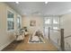 Bright, airy bedroom with rug, seating and natural light at 4217 Royal Harbor Rd, Hollywood, SC 29449
