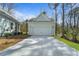 Detached garage with a concrete driveway and well-maintained landscaping at 4217 Royal Harbor Rd, Hollywood, SC 29449