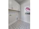View of laundry room with white cabinetry and patterned floor at 4217 Royal Harbor Rd, Hollywood, SC 29449
