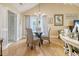 Charming dining area with ample light, a glass table and seating for four guests at 433 Double Eagle Trace, Seabrook Island, SC 29455