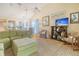 Bright, airy living room featuring vaulted ceilings, hardwood floors, and comfortable seating at 433 Double Eagle Trace, Seabrook Island, SC 29455