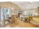 Bright living room featuring vaulted ceilings, hardwood floors, and elegant furnishings at 433 Double Eagle Trace, Seabrook Island, SC 29455