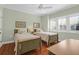 Charming bedroom with two twin beds, shuttered windows and ceiling fan at 4901 Green Dolphin Way, Kiawah Island, SC 29455