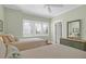 Bedroom featuring two twin beds, hardwood floors and natural light at 4901 Green Dolphin Way, Kiawah Island, SC 29455