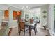 Inviting dining area featuring a glass-top table and seamless access to the kitchen at 4901 Green Dolphin Way, Kiawah Island, SC 29455