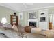 Cozy living room with a fireplace, built-in shelving, and comfortable seating at 4901 Green Dolphin Way, Kiawah Island, SC 29455