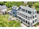 Stunning aerial view of a Charleston-style home with a manicured backyard and charming two-story design at 5 Alexander St, Charleston, SC 29401