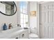 Stylish bathroom with a sleek vanity, hexagon shower, and modern finishes at 5 Alexander St, Charleston, SC 29401