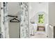View of bedroom featuring twin beds, hardwood floor, sloped ceiling and a closet at 5 Alexander St, Charleston, SC 29401