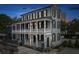 Beautiful two-story home with large balconies, traditional shutters, and a welcoming facade, perfect for Southern living at 5 Alexander St, Charleston, SC 29401