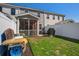 Backyard featuring an abstract car installation and covered screened porch at 509 Nadir Ct, Summerville, SC 29486
