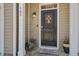 Inviting front door featuring a welcome mat, lovely decor, and sidelight at 509 Nadir Ct, Summerville, SC 29486