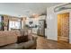 Modern kitchen featuring stainless steel appliances, white cabinetry, and a view into the dining area at 509 Nadir Ct, Summerville, SC 29486