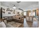 Open-concept living room with stylish decor, hardwood floors, and plenty of space to relax at 509 Nadir Ct, Summerville, SC 29486