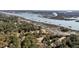 Beautiful aerial view of waterfront homes with private docks along a serene river inlet and scenic views at 6021 Jibe Ct, Awendaw, SC 29429