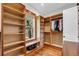 Custom closet offers shelving and clothes rods, filled with natural light at 6021 Jibe Ct, Awendaw, SC 29429