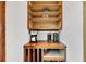 Coffee bar area boasts wooden countertops, open shelving, and modern coffee brewing equipment at 6021 Jibe Ct, Awendaw, SC 29429