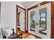 Hallway with a wooden bench leading to a screened-in porch at 6021 Jibe Ct, Awendaw, SC 29429
