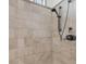 Modern shower featuring sleek fixtures and neutral-toned tilework at 6021 Jibe Ct, Awendaw, SC 29429
