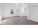 Cozy bedroom featuring attic windows, plush carpet, and convenient closet space at 669 Palisades Dr, Mount Pleasant, SC 29464