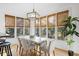 Bright dining area with large windows, natural light, and modern decor at 669 Palisades Dr, Mount Pleasant, SC 29464