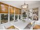 Bright dining area with large windows, natural light, and view of trees outside at 669 Palisades Dr, Mount Pleasant, SC 29464