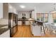 Modern kitchen with stainless steel appliances, granite countertops, and ample cabinet space at 669 Palisades Dr, Mount Pleasant, SC 29464