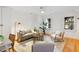 Charming living room featuring hardwood floors, neutral furniture, and large windows at 669 Palisades Dr, Mount Pleasant, SC 29464